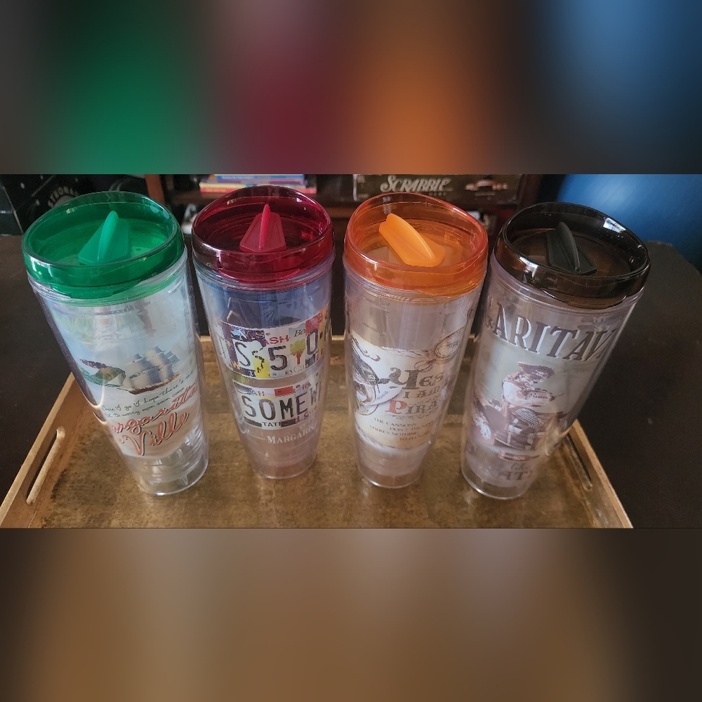 4 Jimmy Buffet Margaritaville 26 Oz tumblers with lids